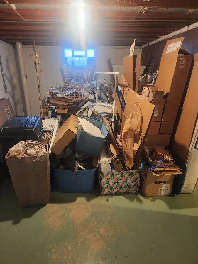 Roll-off dumpster container at job site for 15 Yard Dumpster Rental in Affton